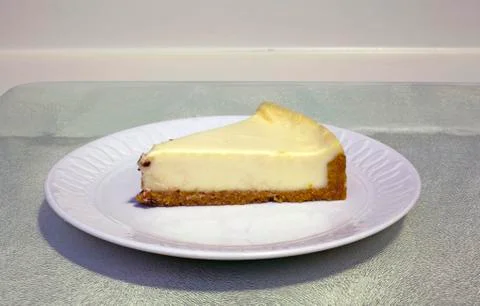 Serving of cheesecake Stock Photos