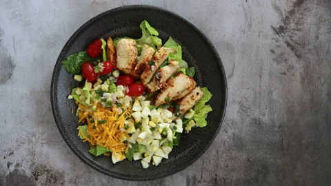 Serving a Chicken Cobb Salad Stock Footage 135769610