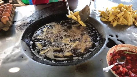 Serving Chips at local chiwaya Stock Footage 108723316