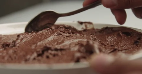 Serving chocolate mousse Stock Footage 82739857