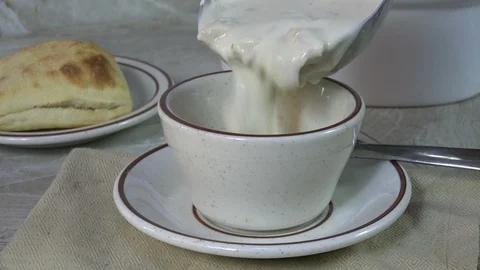 Serving clam chowder Stock Footage 95878487