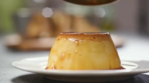 Serving of classic creme caramel. Stock Footage 152529219