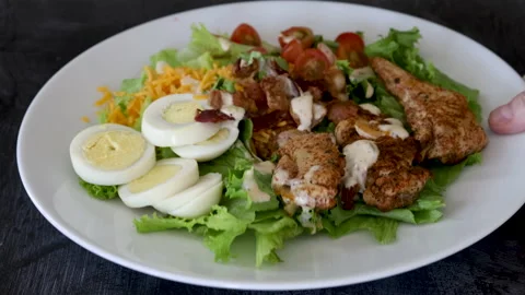 Serving a Cobb Salad Stock Footage 140654887
