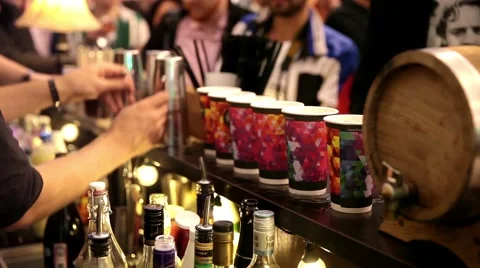 Serving cocktails drinks by bartender in bar Stock Footage 55694368