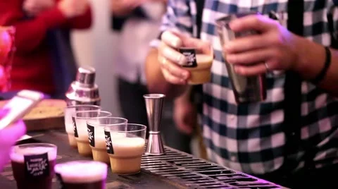 Serving cocktails drinks by bartender in bar Stock Footage 58903538