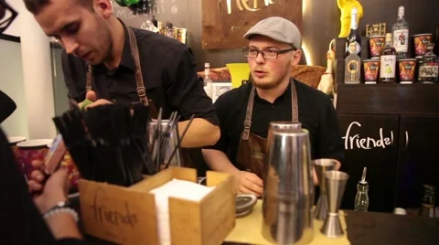 Serving cocktails drinks by bartender in bar Stock Footage 68184982