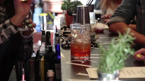 Serving cocktails drinks by bartender in bar Stock Footage 68187430