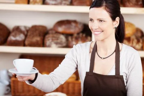 Serving coffee in a bakery Stock Photos