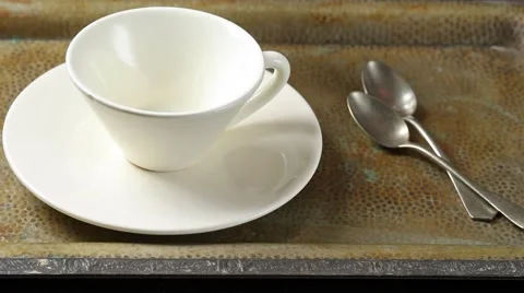 Serving coffee with eclair Stock Footage 58724203