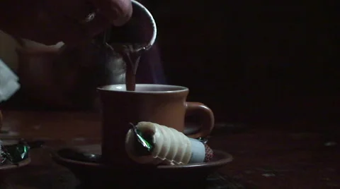 Serving a coffee on flaming rum inside a café Stock Footage 52030408