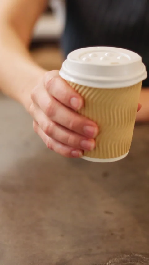 Serving, coffee shop and hands of woman with cup, drink and caffeine beverage Stock Footage 337465843