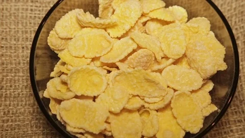 Serving cornflakes, rotating in a circle Stock Footage 72018490