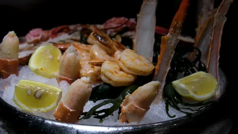 Serving crab in a restaurant. Fresh crab dish. Beautiful serving of a whole crab Stock Footage 302095917