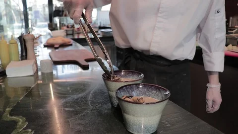 Serving cream of mushroom soup Video stock 129041746