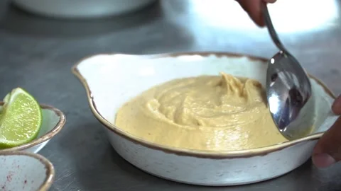 Serving Creamy Dip Stock Footage 318310227
