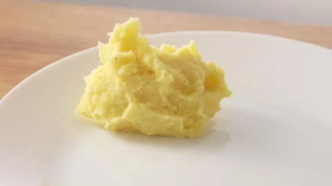Serving Creamy Mashed Potatoes on Plate. Stock Footage 258651422