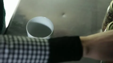 Serving a cup of fresh green tea Stock Footage 20536056