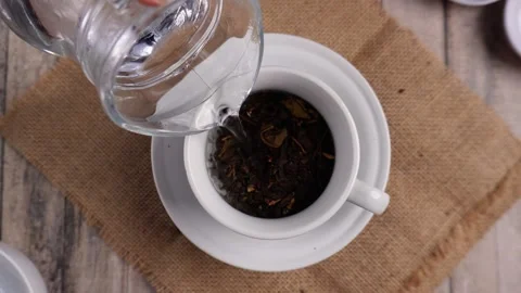 Serving A Cup of Traditional Hot Tea with Saucer As Base 库存影片 267056631