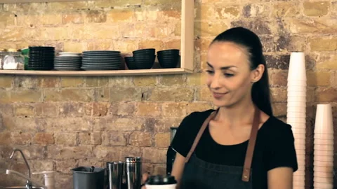 Serving customer at the coffee shop. NFC payment. Stock Footage 94143123