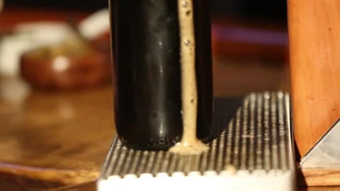 Serving dark beer Stock Footage 132025393