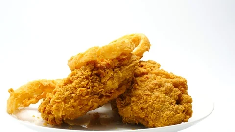 Serving of deep fried crumbed chicken and calamari Stock Footage 105946215