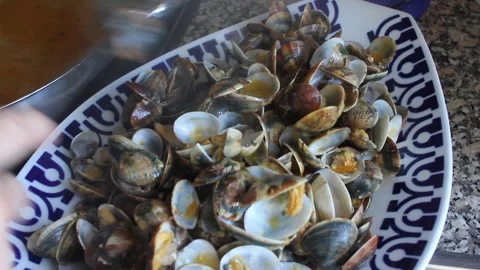 Serving Delicious Cooked Clams on a Decorated Platter in a Kitchen Stock-Footage 346081812