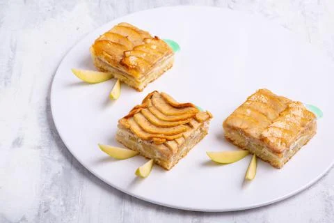 Serving of delicious fruit vanilla cake pieces on a white plate 스톡 사진