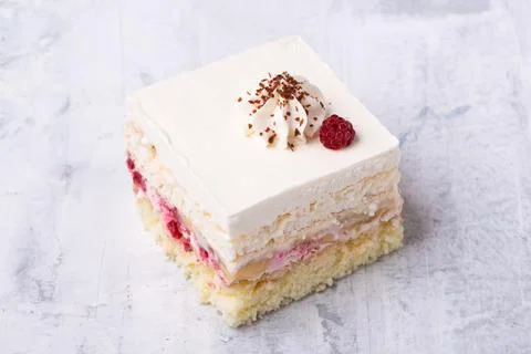 Serving of delicious fruit vanilla cake Stock Photos