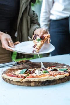 Serving Delicious Pizza Slice Stock Photos