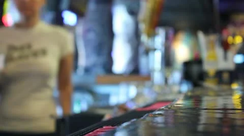 Serving a drink at a bar Stock Footage 14923861