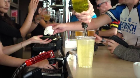 Serving drinks to customers at the bar Stock Footage 71994039
