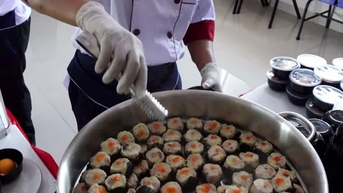 Serving dumplings in a bowl Stock Footage 210133218