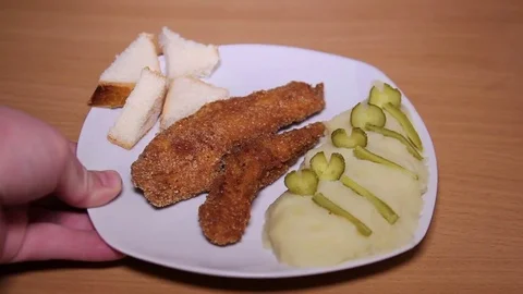 Serving Escalope And Mashed Potatoes Stock Footage 73106963