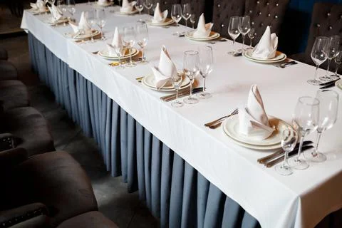 Serving a festive table in a restaurant. Preparation of a banquet for a holid 스톡 사진