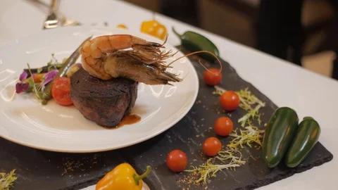 Serving the Filet Mignon in a restaurant on coney island Stock Footage 122256292