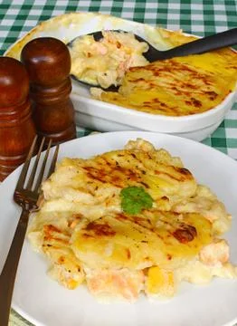 Serving fishermans pie table Stock Photos