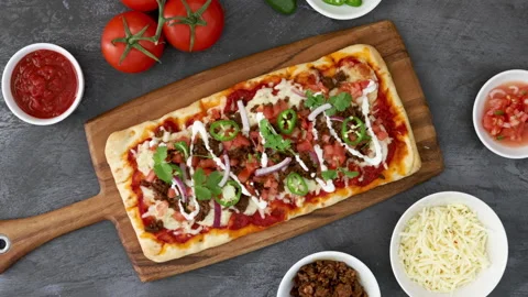 Serving a Flatbread Mexican Pizza Stock Footage 171714994