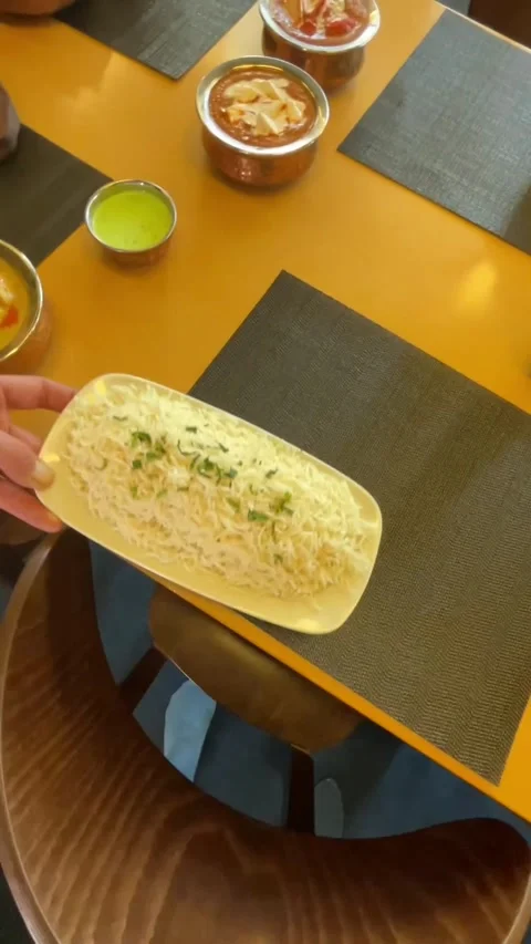 Serving food presentation. Individuals arranging dishes and condiments Stock Footage 335680469