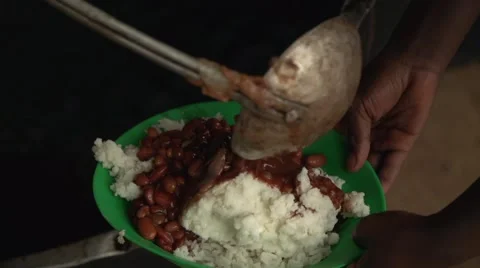 Serving Food in Slow Motion in Uganda, Africa Stock Footage 40920300