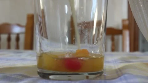 Serving Fresh Fruit Cocktail Into Glass Sundae Dish With Spoon Vídeo Stock 340298482