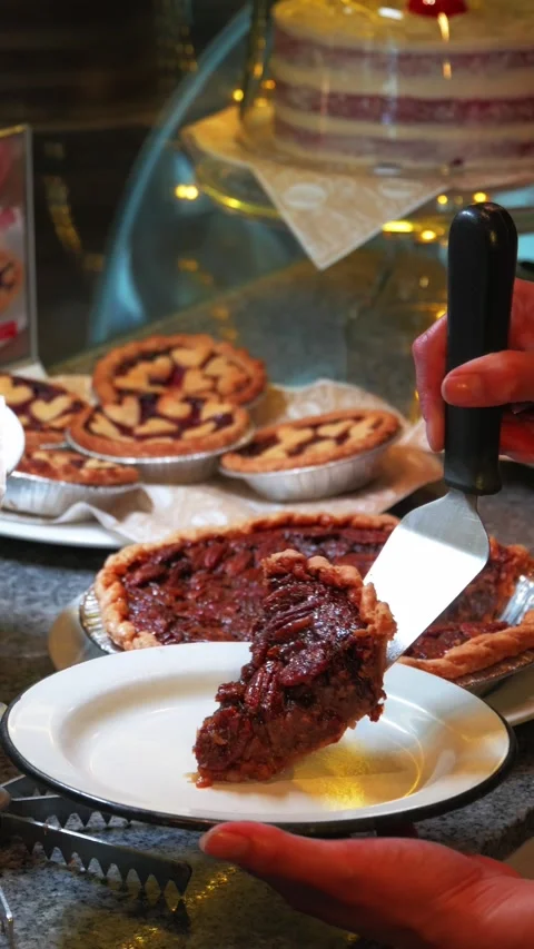 Serving Fresh Pecan Pie Slice on White Plate Video stock 343912199
