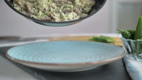 Serving freshly cooked hot chicken biryani in plate.Rice with chicken.close up Stock-Footage 135311177