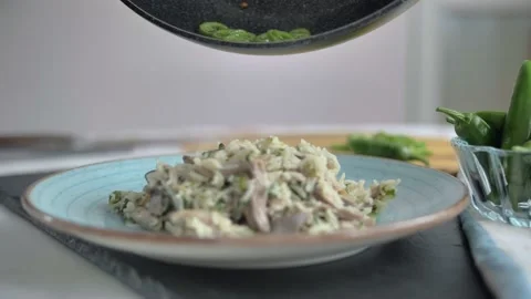 Serving freshly cooked hot chicken biryani in plate.Rice with chicken.close up Stock Footage 135311179