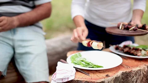 Serving freshly grilled kebabs Stock Footage 63305772