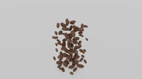 A serving of freshly roasted coffee beans falls onto a white table. Good morning Stock Footage 131069001