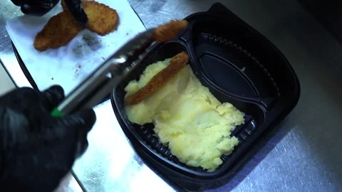 Serving Fried Chicken and Mashed Potatoes Stock Footage 319207311
