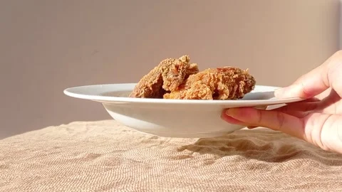 Serving fried chickens on a table Stock Footage 146254095