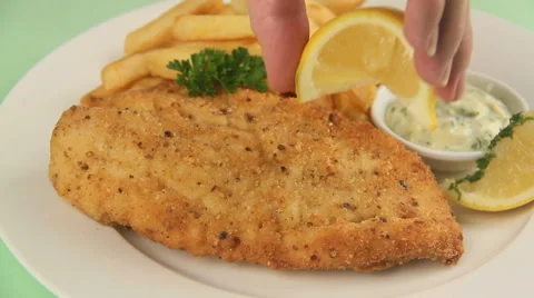 Serving Fried Fish With lemon Stock Footage 62025061