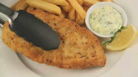 Serving Fried Fish With Parsley Stock Footage 62023884
