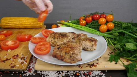 Serving fried meat with vegetables 動画素材 170604488